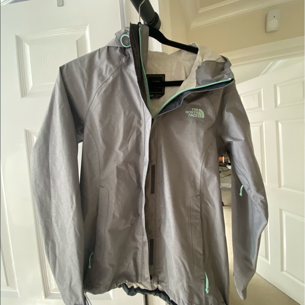 BRAND NEWGrey north face jacket with teal zippers!